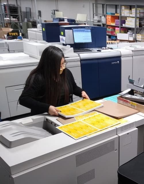 image of women working with printer